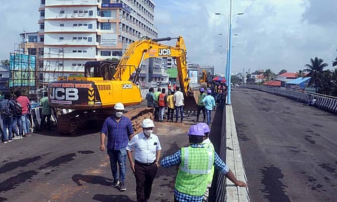 Asphalt layer being removed as part of Palarivattom flyover demolition. (Photo | A Sanesh, EPS)