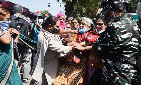 Police detain protesters of Hathras gang rape case near Uttar Pradesh Bhawan in New Delhi on Wednesday (Photo | Parveen Negi, EPS)