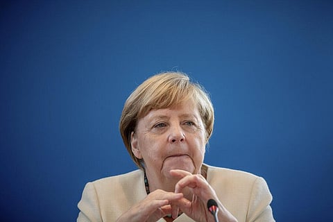 German Chancellor Angela Merkel takes part in a meeting. (Photo | AP)