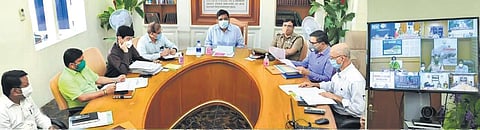 Chief Secretary K Shanmugam holding a discussion with Collectors through video conference on Friday | Express