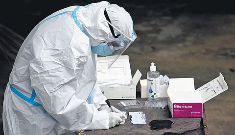 A health worker notes down reading from samples collected. (Photo | Parveen Negi, EPS)