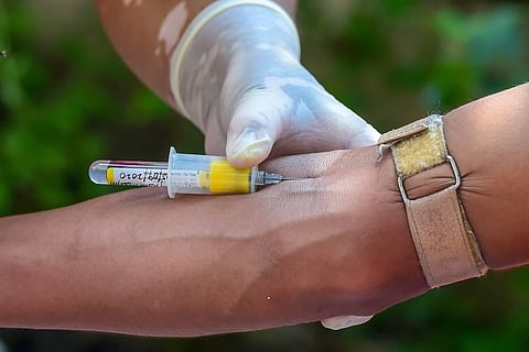 A health worker collects a blood sample for COVID-19 antibody test during Unlock 4 in New Delhi (Photo | PTI)