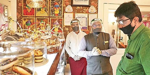 Customers at Mayfair Hotel in Bhubaneswar on Saturday. (Photo | Irfana, EPS)