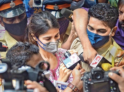 Rhea Chakraborty outside NCB office. (Photo | PTI)