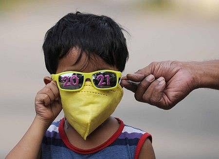 A child seen in 2021 goggles and a mask as precaution against COVID-19. (Photo | A Sanesh, EPS)