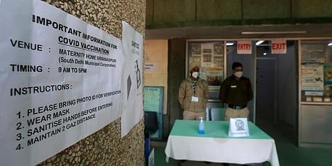 A notice displays information related to the COVID inoculation at Delhi's first vaccination centre in Srinivaspuri area on Thursday. (Photo| Shekhar Yadav, EPS)