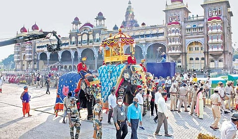 A farmer  looks at his farm land inundated by flood waters at Murnal village in Bagalkot district  | d hemanth