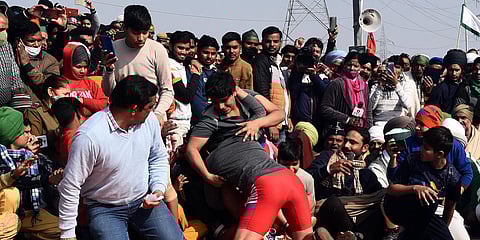 Farmers organize a wrestling competition during their protest against the new farm laws at the Ghazipur border in New Delhi. (Photo| Parveen Negi, EPS)