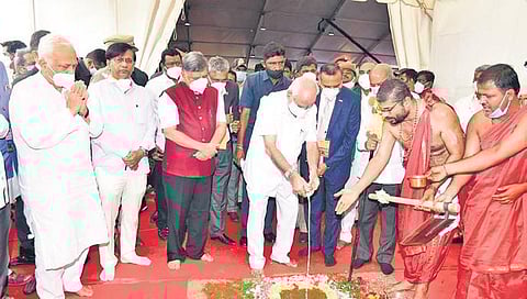 Chief Minister B S Yediyurappa lays the foundation stone for the toy cluster at Talbal village in Koppal district on Saturday | Express
