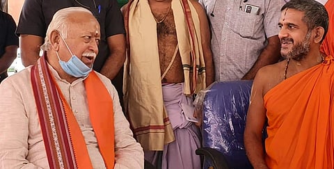 RSS chief Mohan Bhagwat with Sri Vishwaprasanna Theertha of Sri Pejavar Mutt, Udupi in Bengaluru on Monday (Photo | Special arrangement)