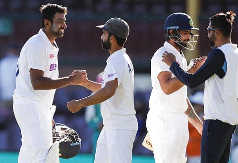 Ashwin, left, is congratulated by Indian captain Ajinkya Rahane as Hanuma Vihari is congratulated by teammate Mohammed Siraj, right after the incredible draw at Sydney. (Photo | AP)