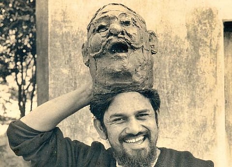 Playfully posing with his portrait of Bade Ghulam Ali Khan