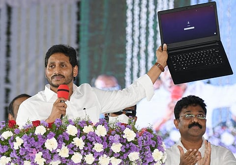 Andhra Pradesh Chief Minister YS Jagan Mohan Reddy addresses a public gathering after launching the second edition of Jagananna Amma Vodi scheme in Nellore on Monday. (Photo | Express)