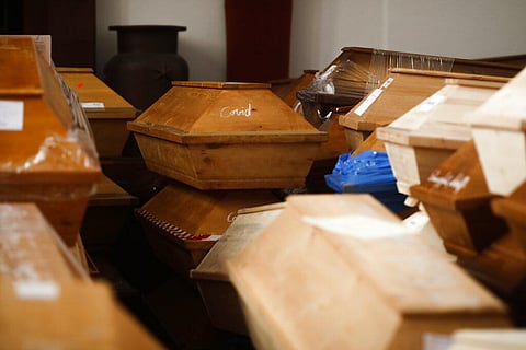 Coffins containing deceased people wait in the worship room of the crematorium in Meissen, Germany. (Photo|AP)