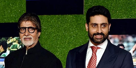 Bollywood star Amitabh Bachchan (L) with his actor son Abhishek Bachchan. (Photo | PTI)