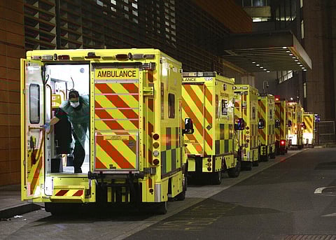 A row of ambulances are parked outside the Royal London Hospital in London. (Photo | AP)