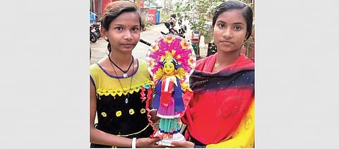 Girls of Kudumi Mohanta community holding an idol of Tusu Devi | EXPRESS