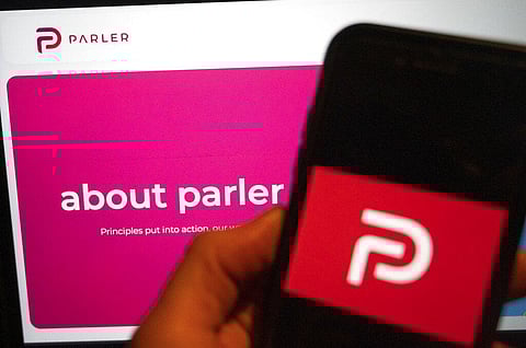 The logo of the social media platform Parler is displayed in Berlin, Jan. 10, 2021. (Photo | AP)