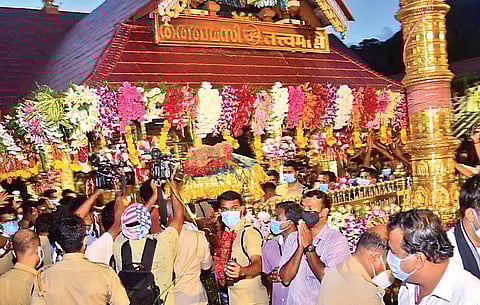 Sacred ornaments (Thiruvabharanam) being carried to the sreekovil of Sabarimala Lord Ayyappa temple after being accorded reception in front of the golden flag mast on Thursday | Shaji vettipuram
