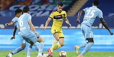 Mumbai City FC and Hyderabad FC players battle for the ball during an ISL encounter. (Photo | ISL)