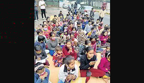 The community workshop with kids at the Swami Vivekananda Marg Basti in Chanakyapuri, Delhi.