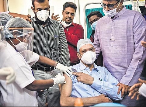 Medical Superintendent S Trilok Shyam gets the vaccine shot at the Area Hospital in Malakpet on Saturday. (Photo | Vinay Madapu, EPS)