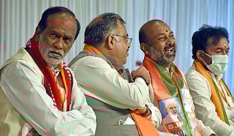 (From L) Laxman Reddy, Tarun Chugh,BJP national general secretary, G Kishan Reddy, Union Minister of State for Home Affairs, Bandi Sanjay Kumar, BJP State president. (Photo | S Senbagapandiyan, EPS)