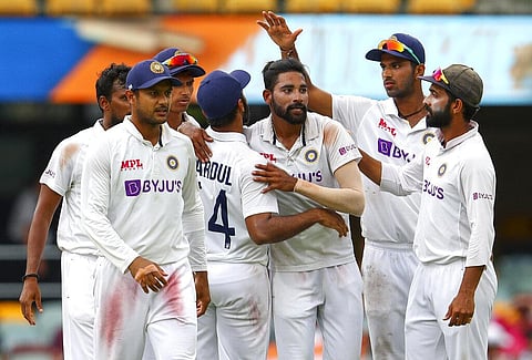 India's Mohammed Siraj, centre, is congratulated by teammates after taking his fifth wicket. (Photo | AP)