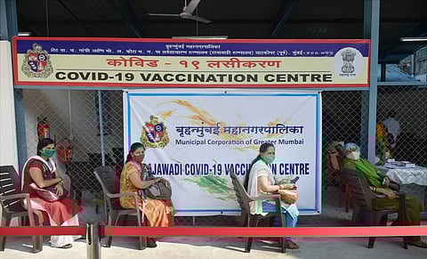 Beneficiaries wait to be vaccinated with Covishield vaccine during a countrywide inoculation drive against COVID-19 at Rajawadi Municipal Hospital in Mumbai. (Photo | PTI)