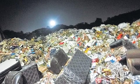 Garbage piled up at a transfer station in Jawaharnagar,  Hyderabad, after contractors stopped transporting them, as their agreement   with GHMC ended. (Photo I EPS) 