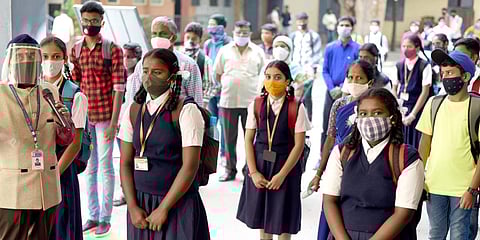 Students of grade 10 and 12 attend classes with coronavirus precautions as Karnataka Government opened schools after a gap of more than nine months in Bengaluru. (Photo | EPS/Nagaraja Gadekal)