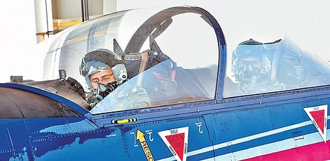 Air Chief Marshal RKS Bhadauria, with a flying instructor, flies a PC-7 Mk-II trainer