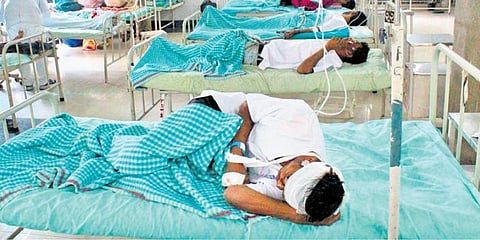 Injured labourers admitted to a hospital in Surat on Tuesday. (Photo | PTI)