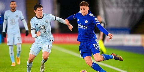 Chelsea's Mason Mount (L) tries to stop Leicester's Harvey Barnes during an English Premier League match. (Photo | AP)