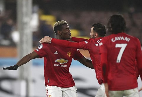 Manchester United's Paul Pogba, left, celebrates with teammates after scoring his side's second goal during the English Premier League (Photo | AP)