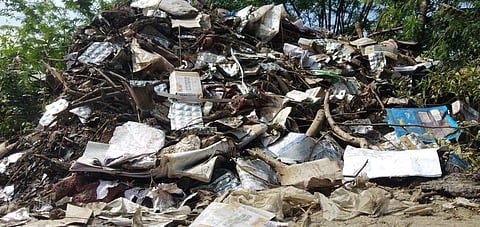 Biomedical waste dumped alongside the Thiruneermalai Lake (Photo | Special arrangement)