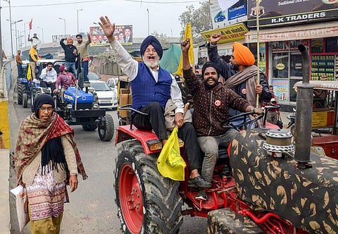Farmers take out a tractor march as part of the preparations for their planned tractor parade in the national capital on Republic day during a protest against the new farm laws. (Photo | PTI)