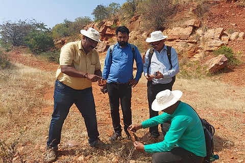 A team of ASI officials from Nagpur exploring Ranganatha Hill near Taminaalu village of Badami (Photo | Special arrangement)