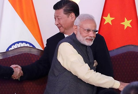 Indian Prime Minister Narendra Modi, front and Chinese President Xi Jinping. (File Photo | AP)