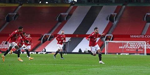 Bruno Fernandes' stunning free-kick inflicted more misery on Liverpool as Manchester United progressed to the fifth round of the FA Cup with a thrilling 3-2 win at Old Trafford on Sunday. (Photo | AP)