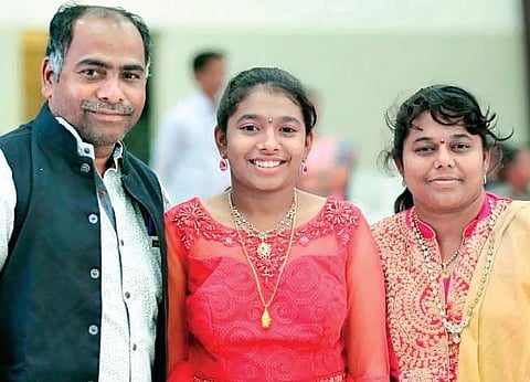 16-year-old Kalagarla Sahithi with her parents. (Photo | EPS)