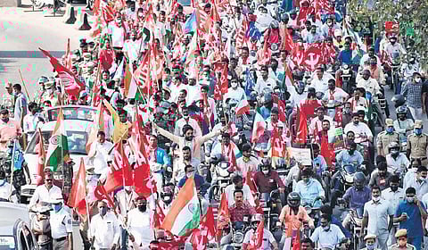 Farmers and members of other organisations take out a huge rally from Saroornagar indoor stadium to Uppal Ring Road, against the farm laws, in Hyderabad on Tuesday