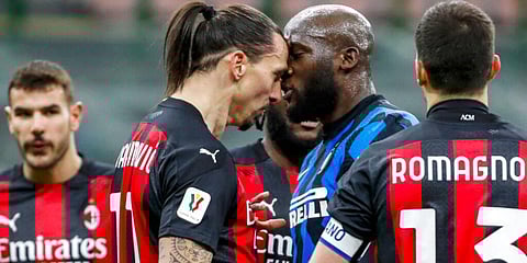 AC Milan's Zlatan Ibrahimovic (CL) and Inter Milan's Romelu Lukaku (CR) argue during an Italian Cup round of 8 match. (Photo | AP)