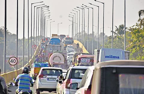 Vehicles flood the two-lane bypass soon after its opening