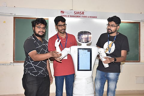 Students with robot 'Maya' in Hubballi (Photo | EPS/ D Hemanth)