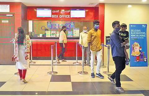 People queue at INOX in Garuda Swagath Mall, Jayanagar, on Friday | Meghana Sastry