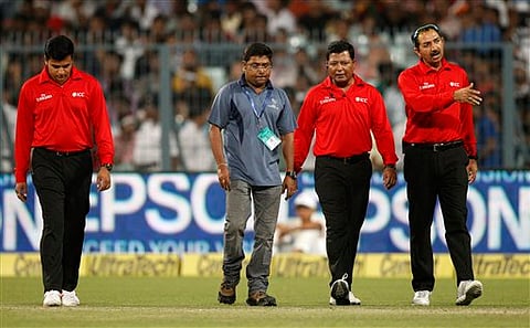 Umpires Anil Chaudhary, right, Vineet Kulkarni, left, and Chettithody Shamshuddin, second right. | (File/AP)