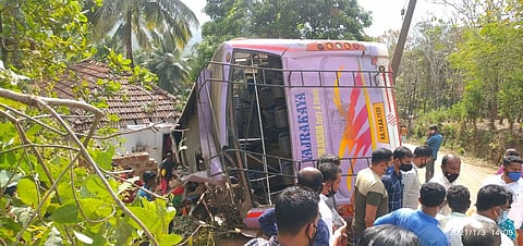 Overturned bus that was carrying a wedding party in Karnataka on Sunday. (Photo | Express)