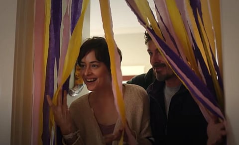 Dakota Johnson and Casey Affleck in a still from 'Our Friend' (Photo | YouTube screengrab)