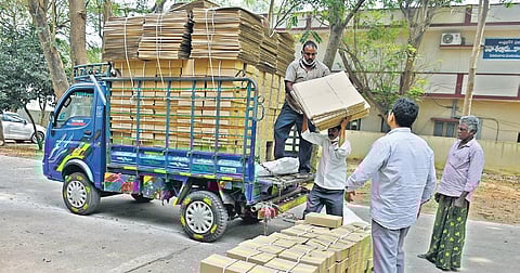 Election material being unloaded at RDO office in Penamaluru of Krishna district  on Friday. (Photo | Prashant Madugula, EPS)